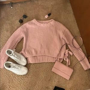 Light pink sweater with bows